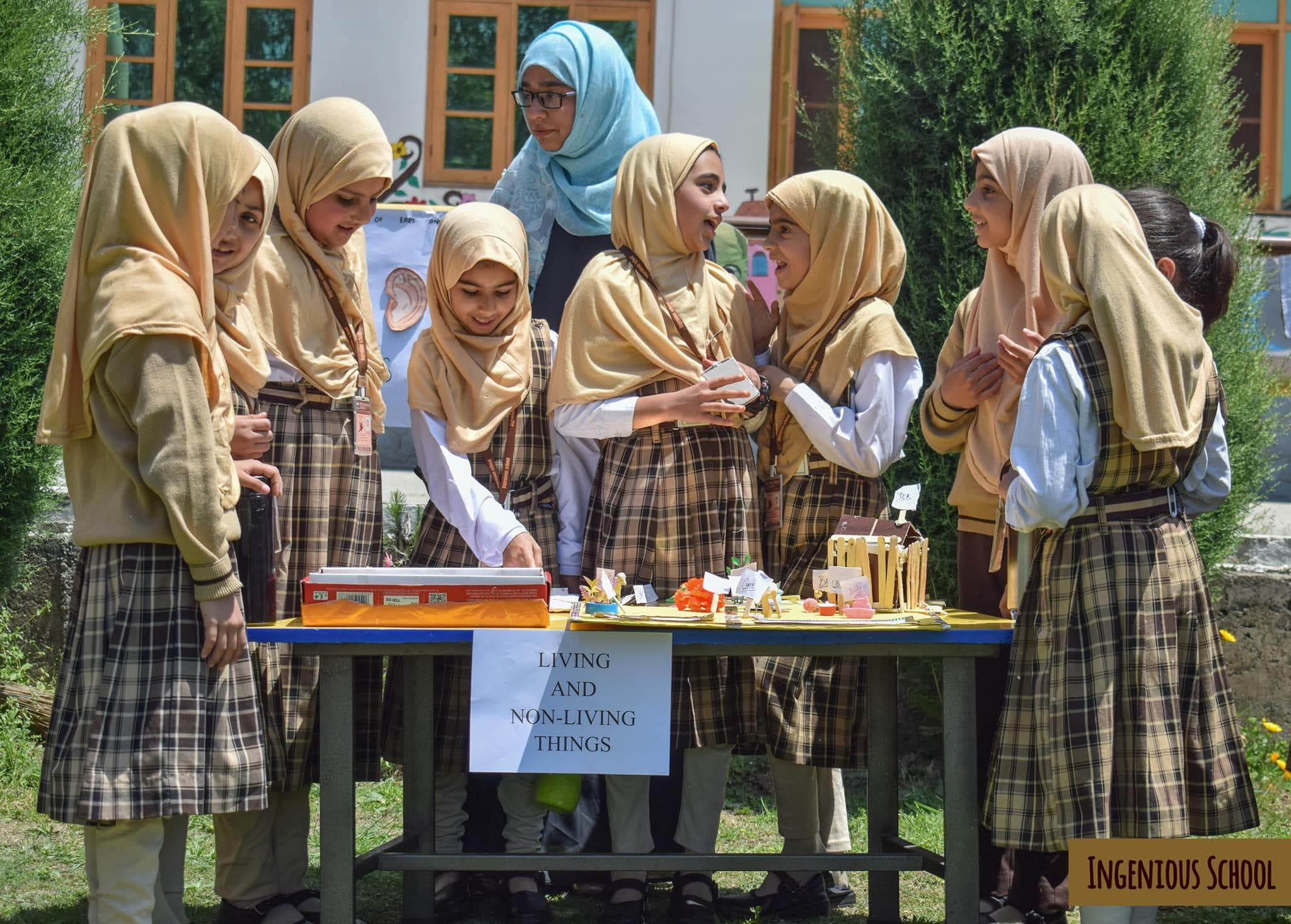 Students presenting a science exhibition project